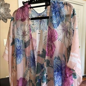 Beautiful OSFA floral Ruana Spring pastels. NWT light and airy. Beautiful